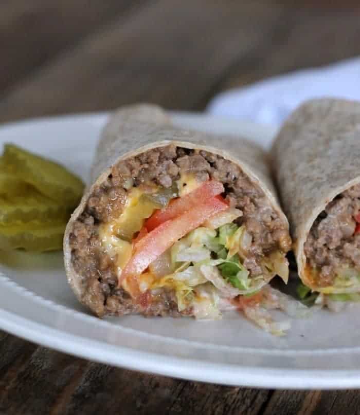 healthy cheeseburger wrap served with pickles