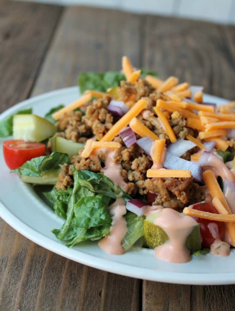 Lightened Up Cheeseburger Salad. 333 calories. Low carb and high protein. Delicious make-ahead salad. Mason jar salad instructions included.