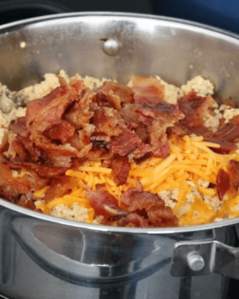 bacon and cheese on eggs