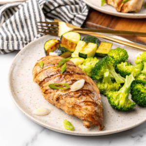 front picture of the grilled asian chicken on a plate.