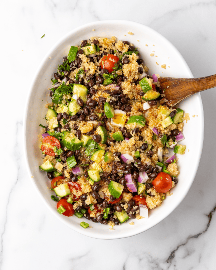 all of the mexican salad ingredients mixed together in a bowl.