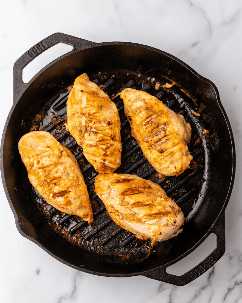 cooked chicken on grill pan.