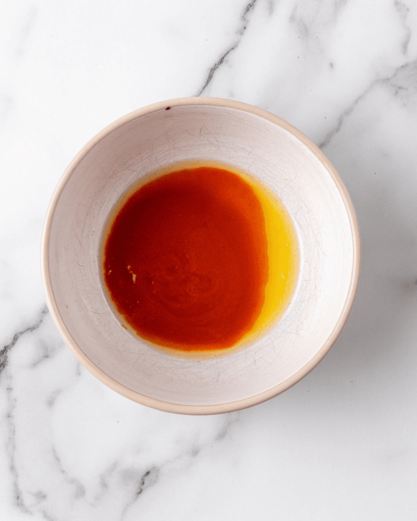 mix hot sauce and butter in a bowl.
