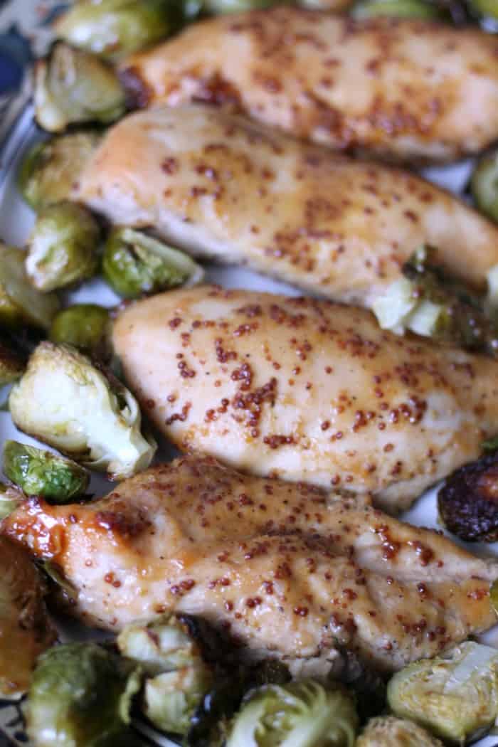 Baked Mustard Chicken Breast : Baked honey mustard chicken breast with a touch of lemon - In a mixing bowl, whisk together the honey, mustard, and olive oil.