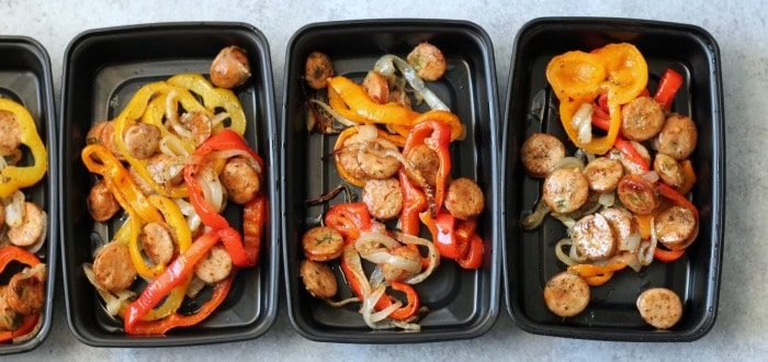 Sheet pan sausage and veggies portioned out into individual servings for the week.