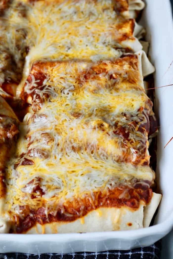 easy beef enchiladas after they come out of the oven
