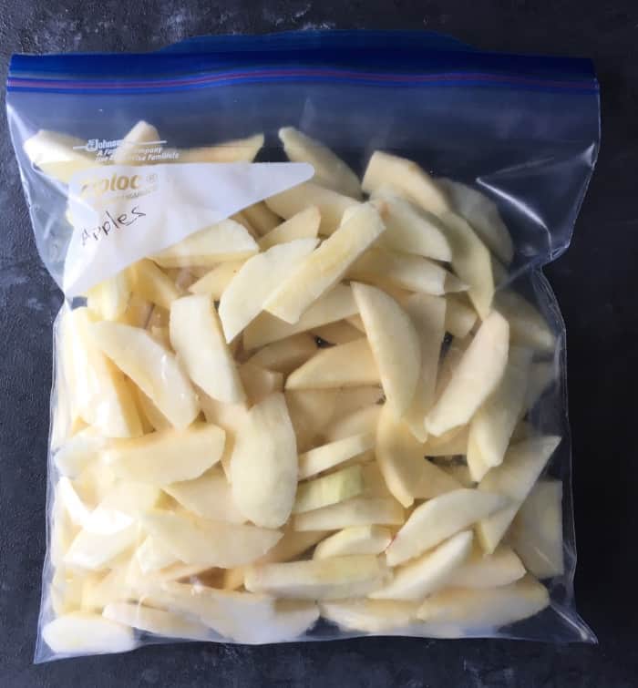 Ziplock bag filled for storing apples in the freezer. 