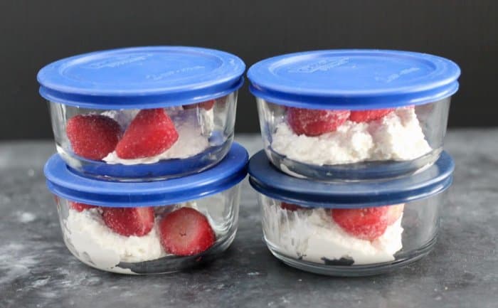 bowls of cottage cheese and fruit