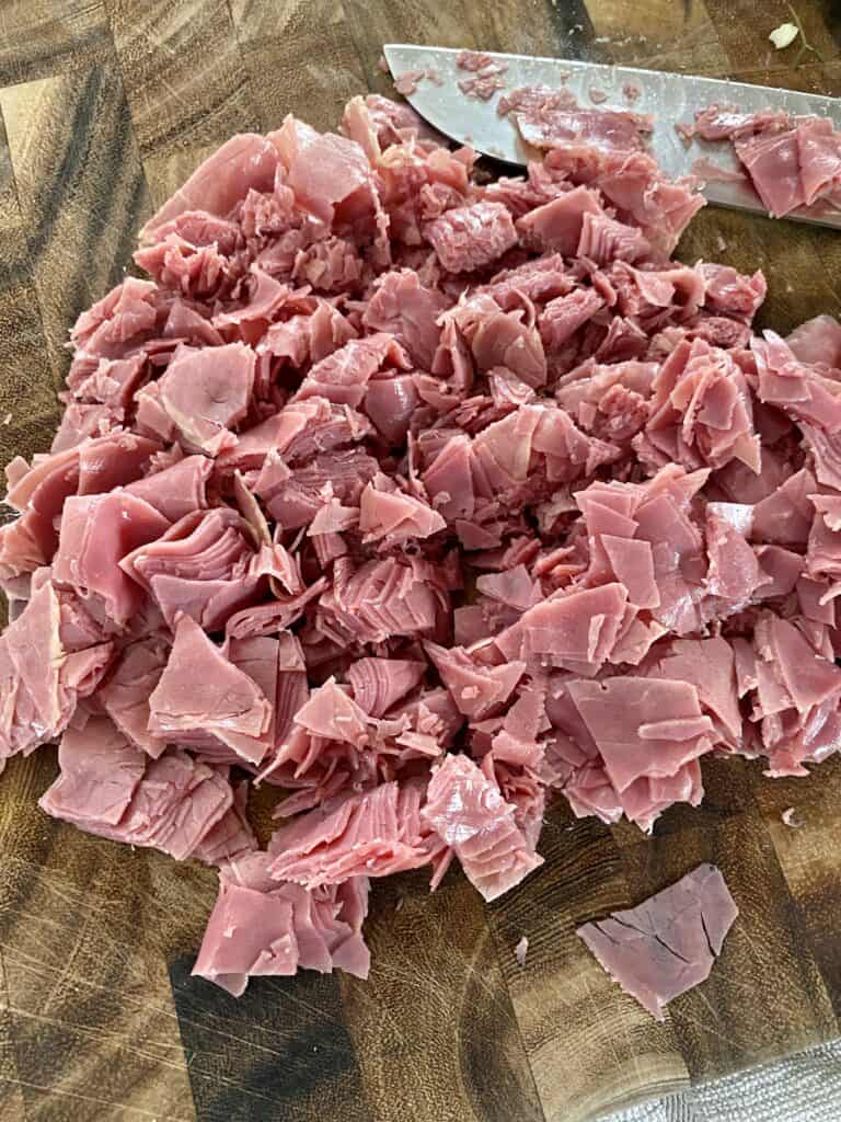 Sliced corned beef on a cutting board