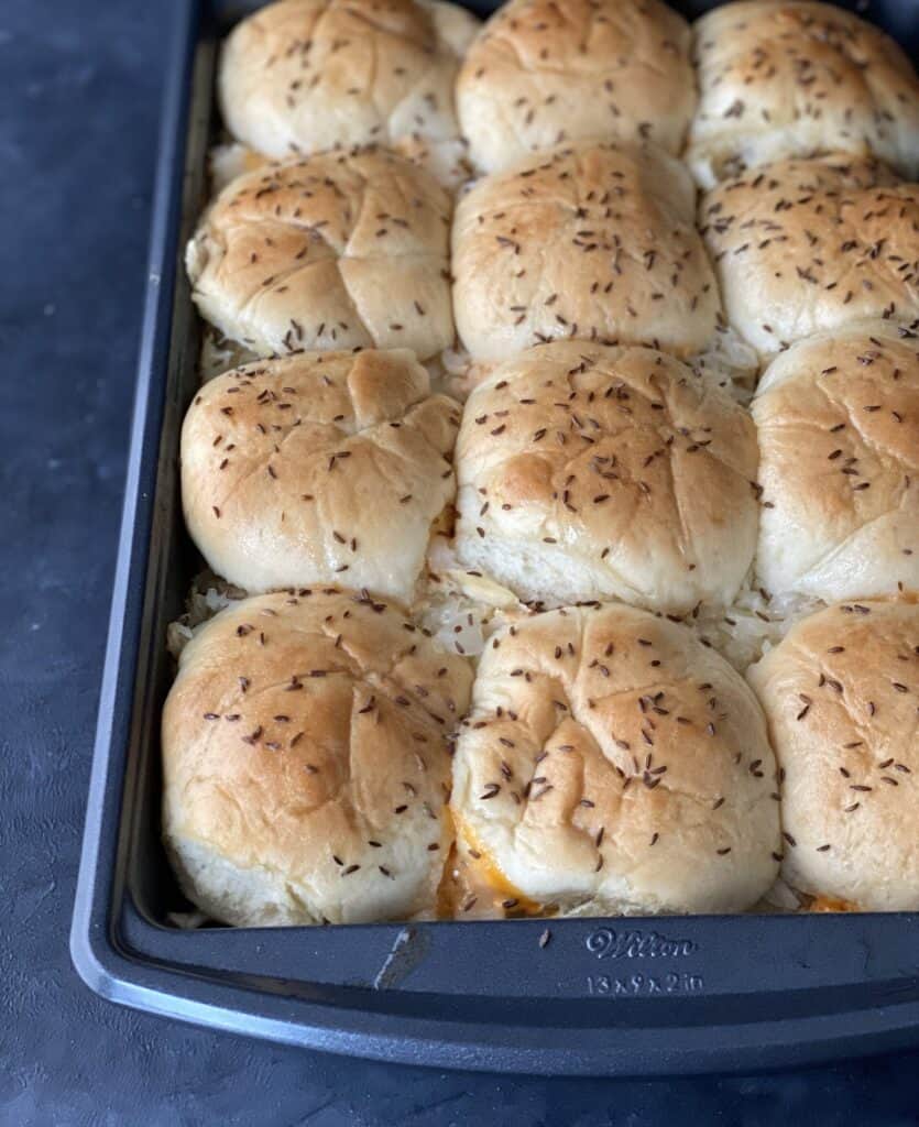 baked reuben sliders in a pan 