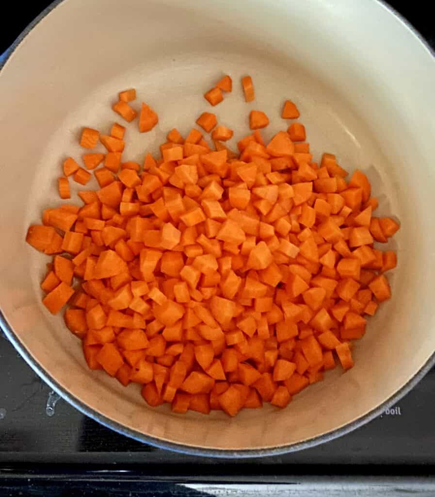 Diced carrots cooking in a pot