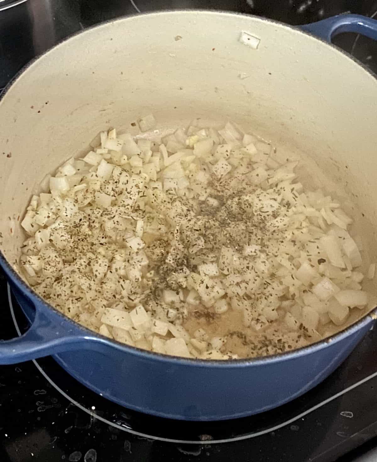 Onions cooking as a base for a bolognese sauce 