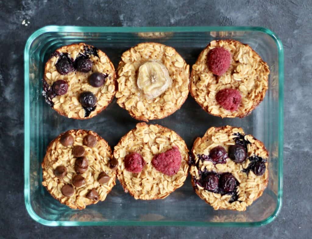 baked oatmeal cups in a glass container