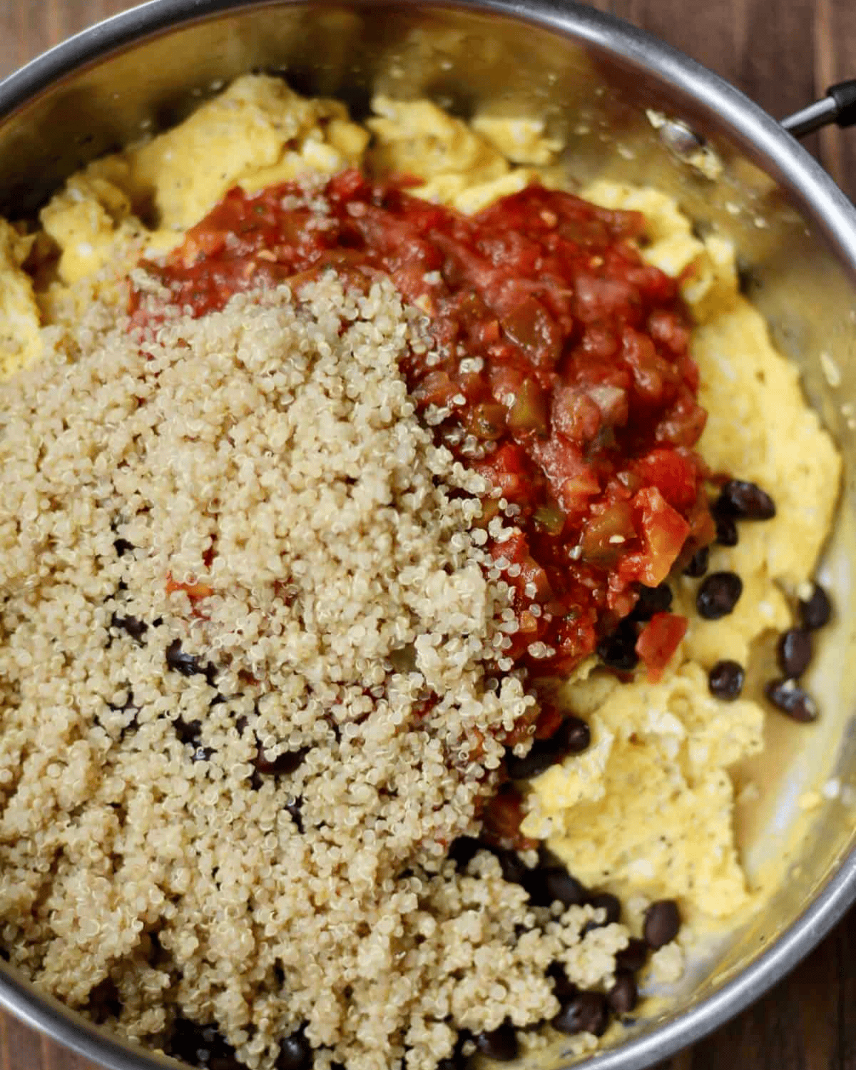 ingredients in a pan for veggie breakfast burritos