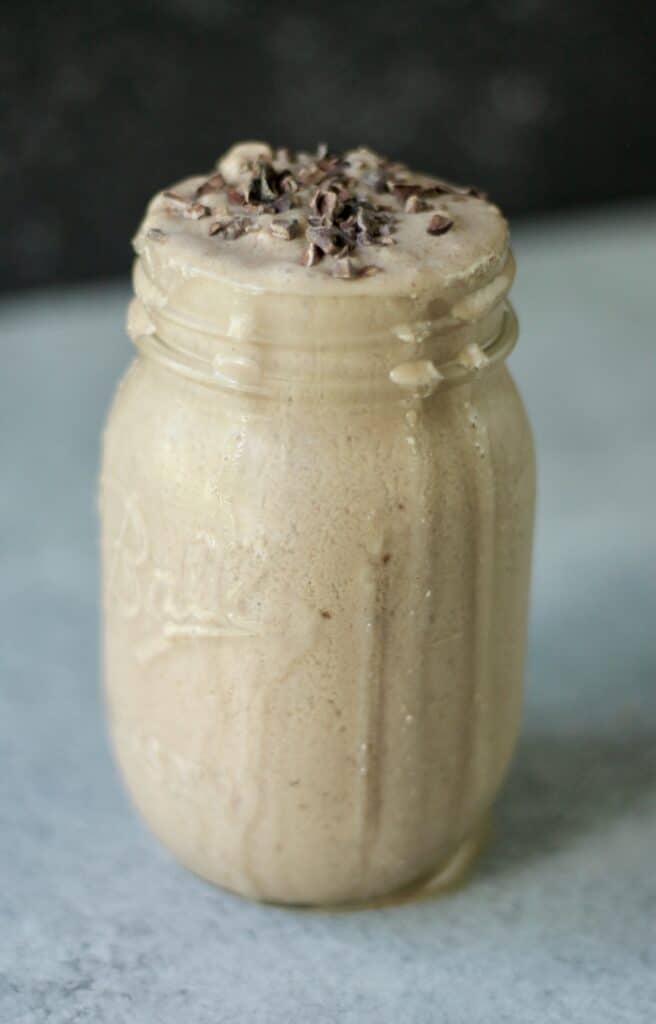 Chocolate peanut butter smoothie in a mason jar