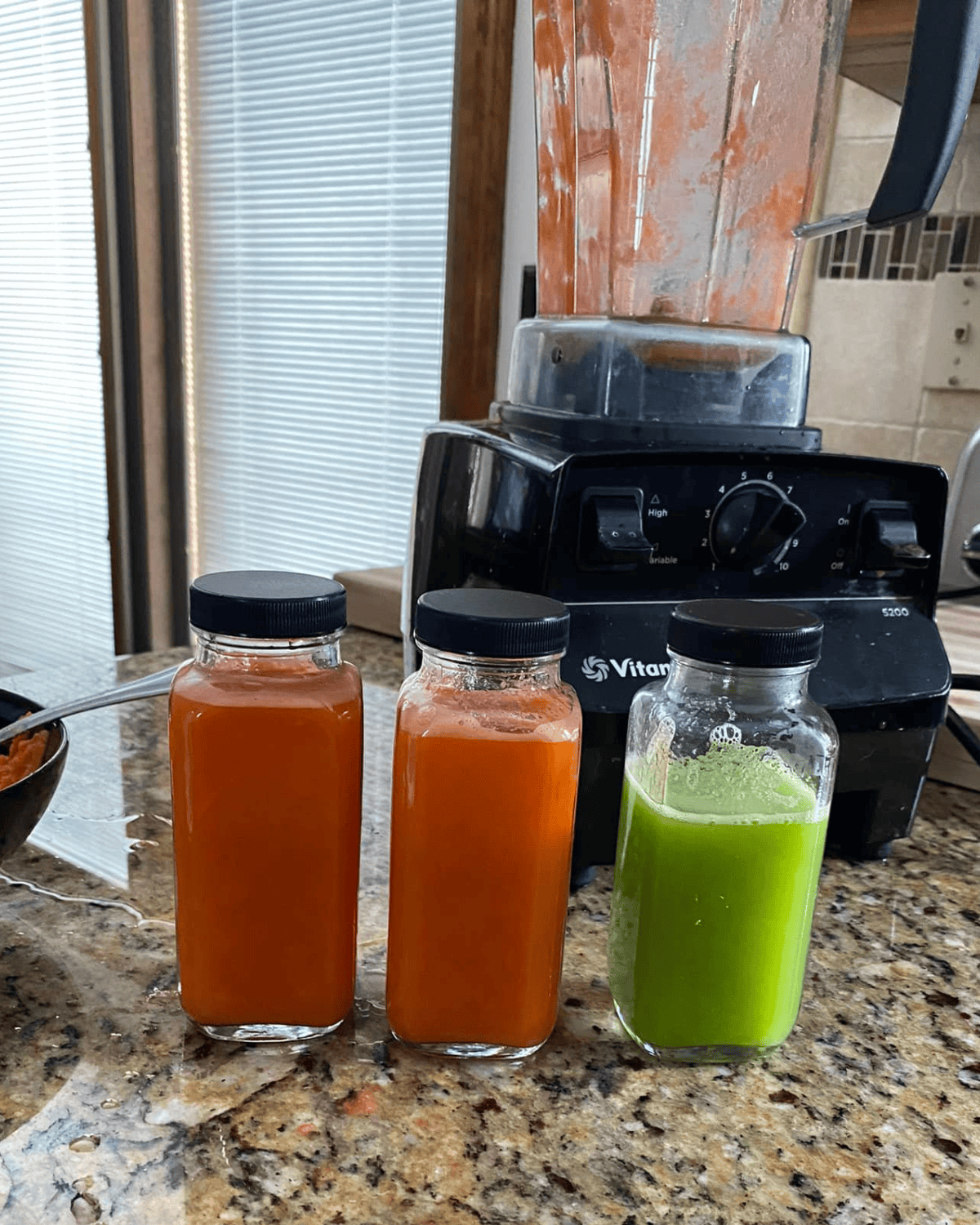 making juice with a vitamix.