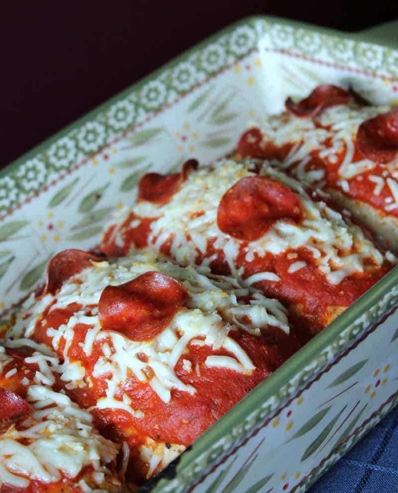 Keto pizza ideas - chicken breasts topped with sauce, cheese, and pepperoni