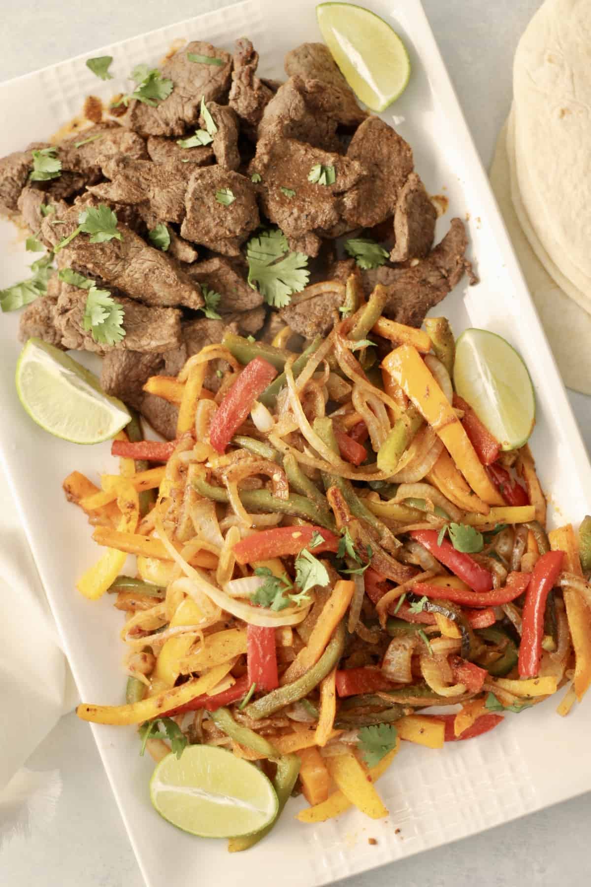 Butcherbox steak fajitas on a platter