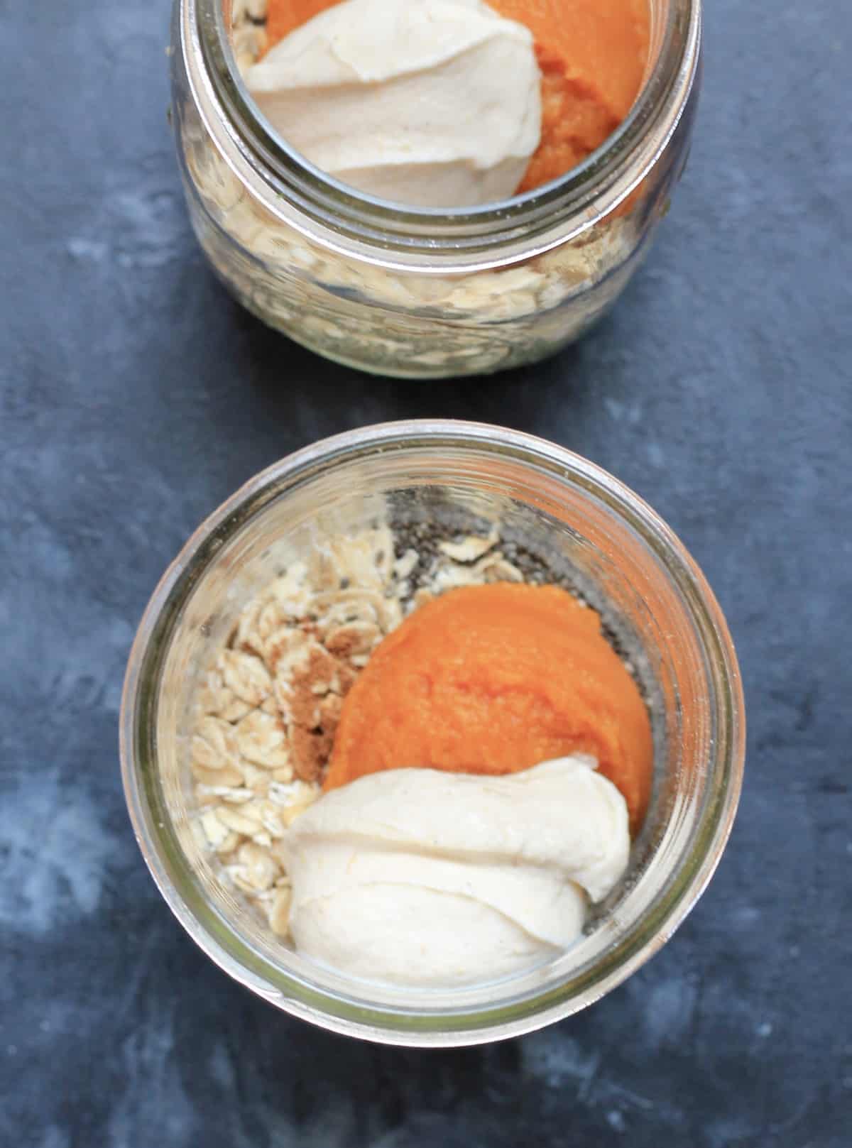 pumpkin puree and greek yogurt on top of the oats