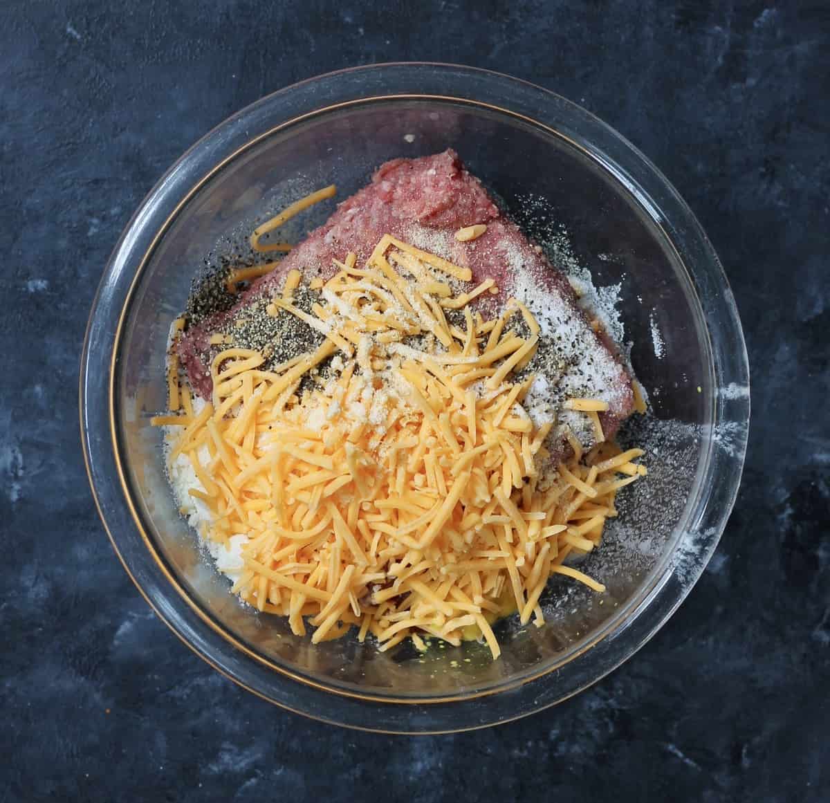 mini meatloaf recipe mix in a glass mixing bowl