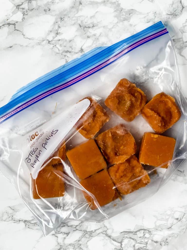 small portions of canned pumpkin in a plastic freezer bag