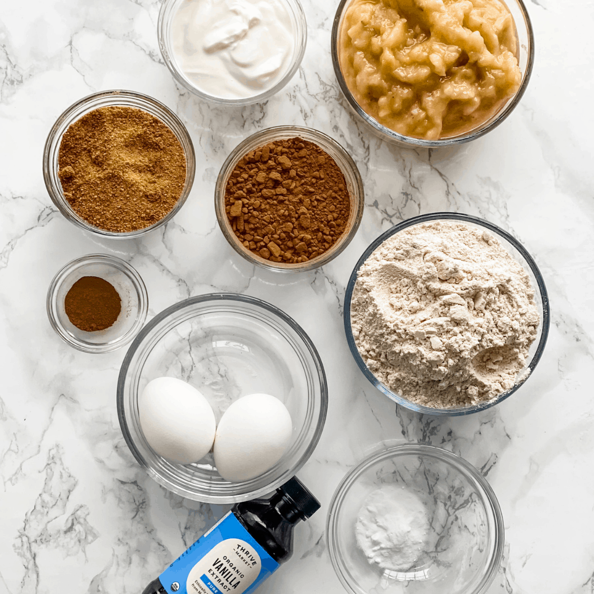 ingredients to make chocolate banana muffins.