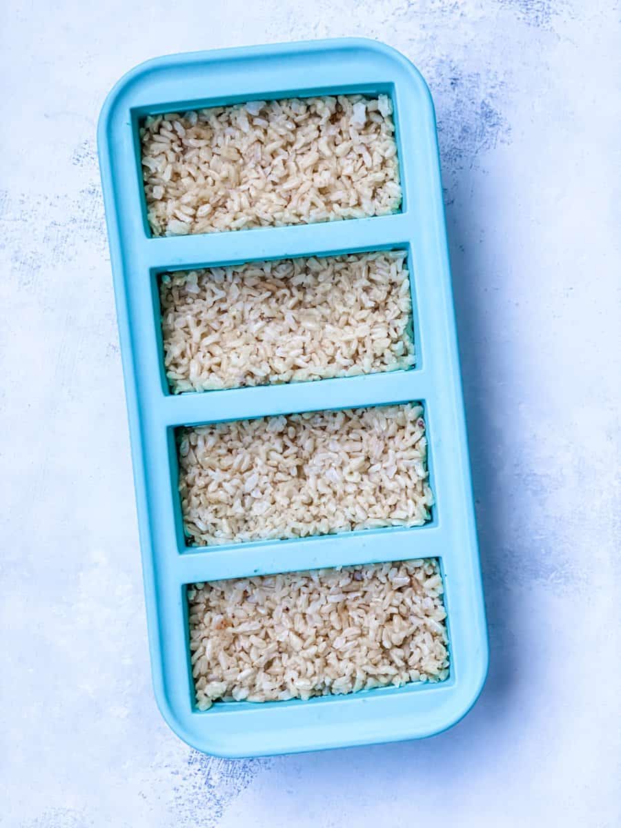 rice in a silicone tray to go into the freezer