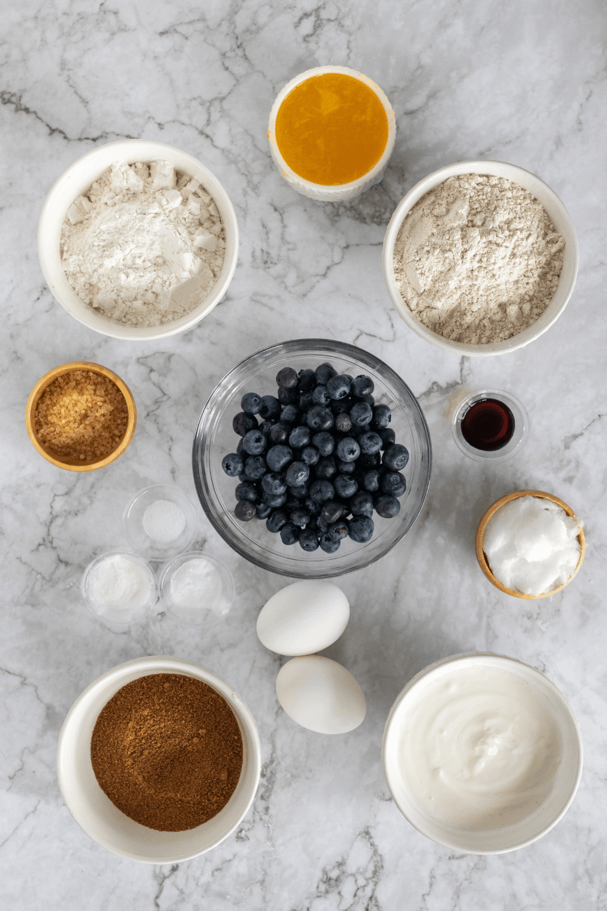 ingredients for make homemade blueberry Greek yogurt muffins from scratch.