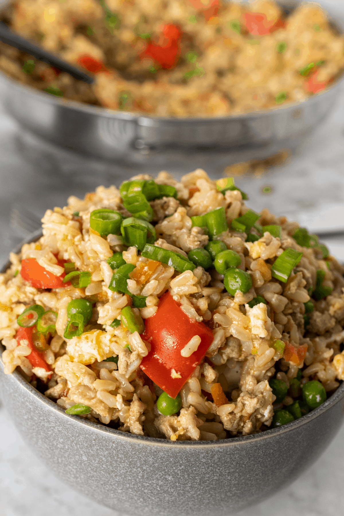 close-up picture of fried rice with ground turkey and vegetables.