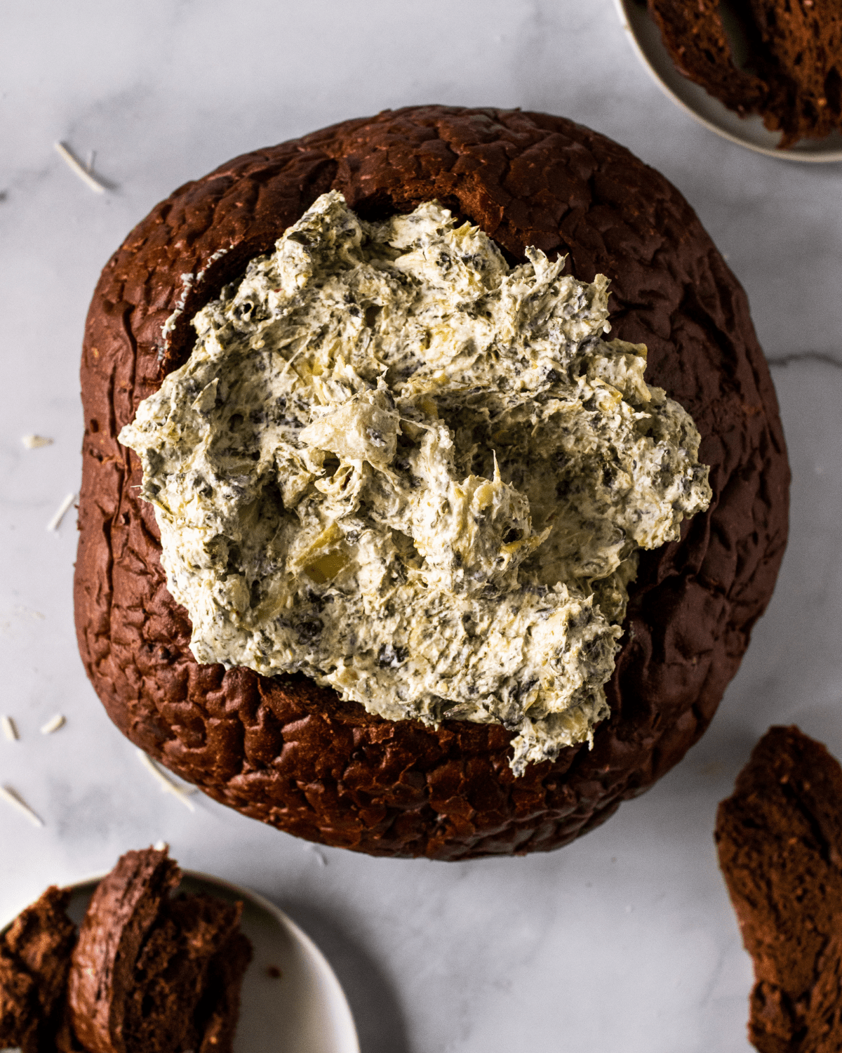 spinach artichoke dip in a bread bowl