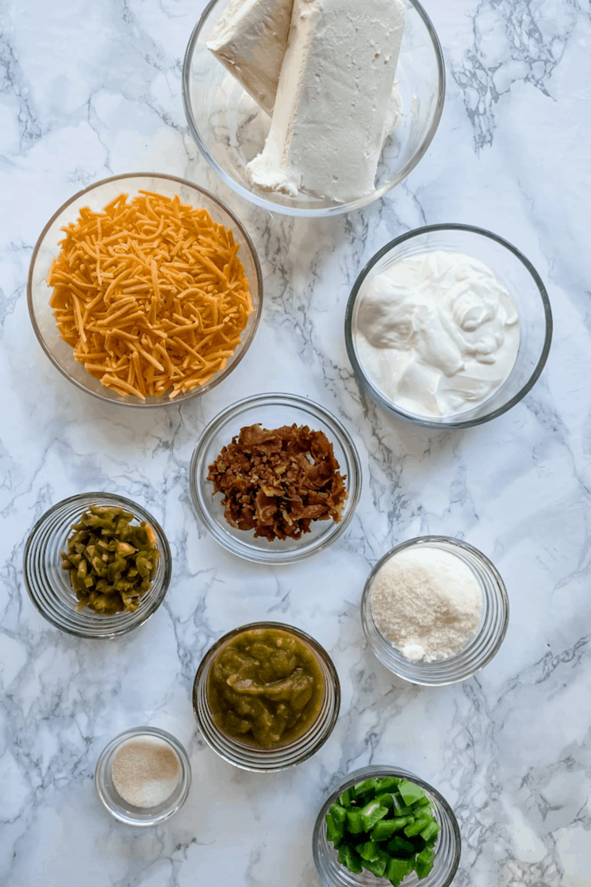 All of the ingredients needed to make jalapeno popper dip.