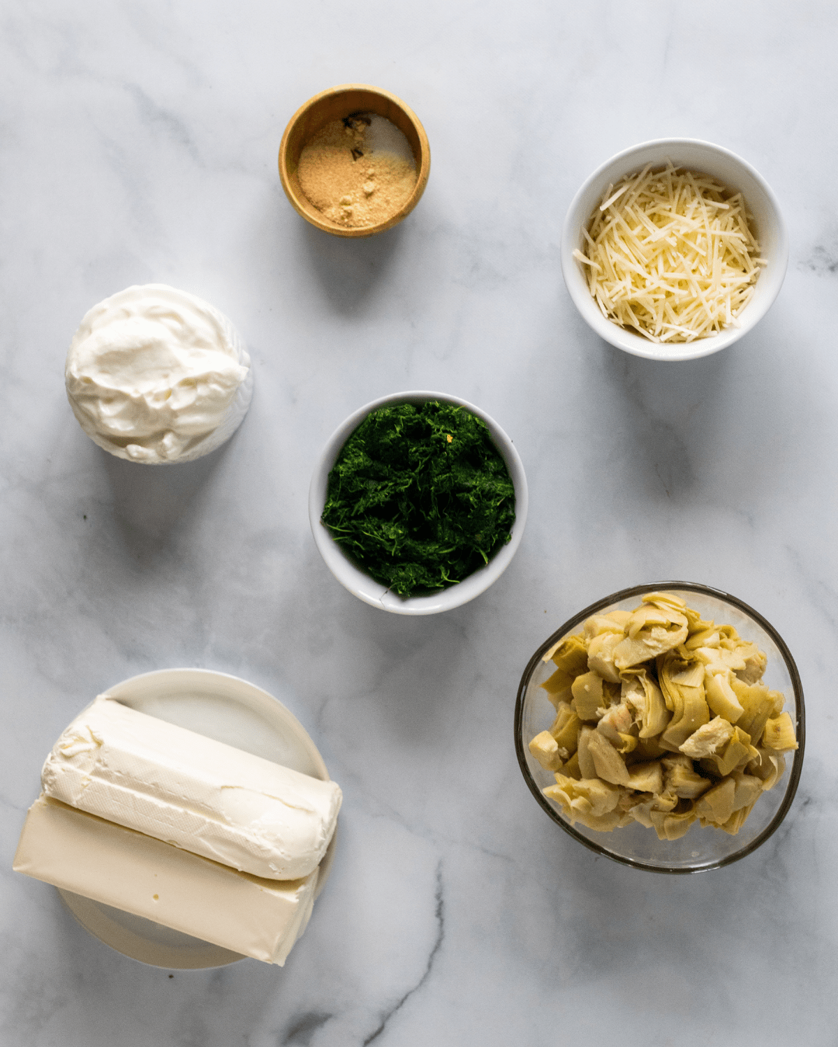 ingredients to make healthy spinach artichoke dip