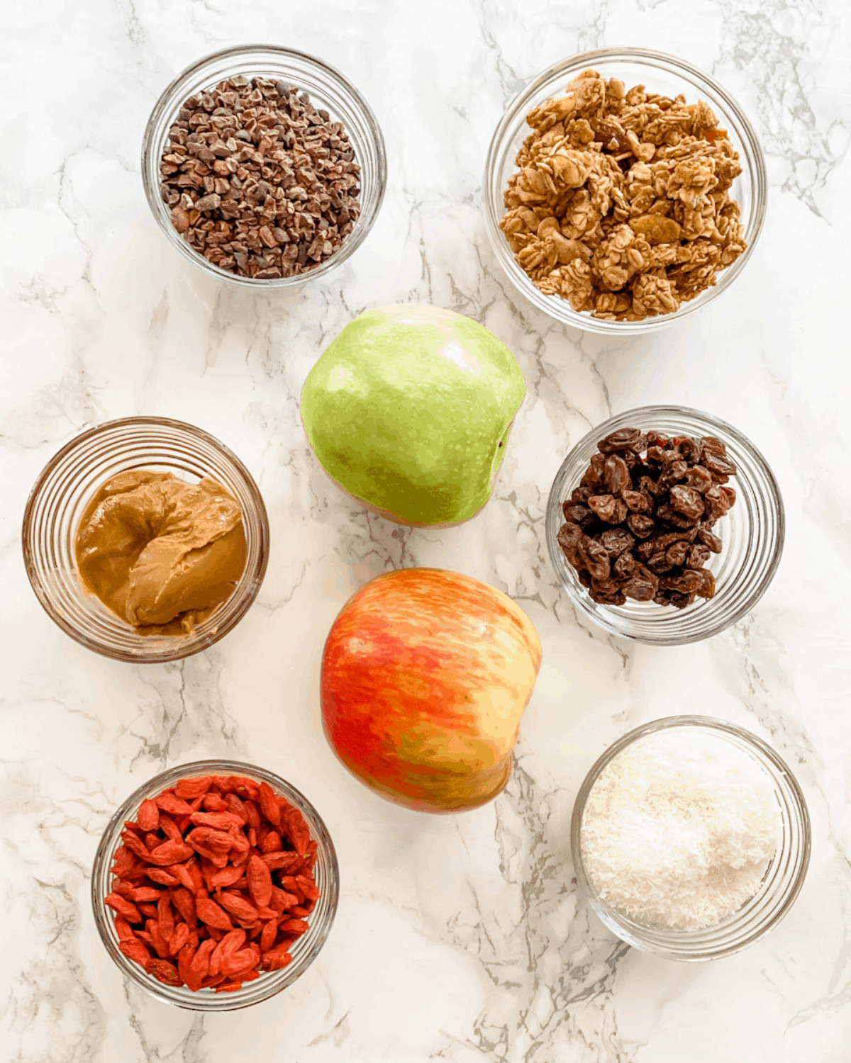 all the ingredients to make an apple peanut butter sandwich