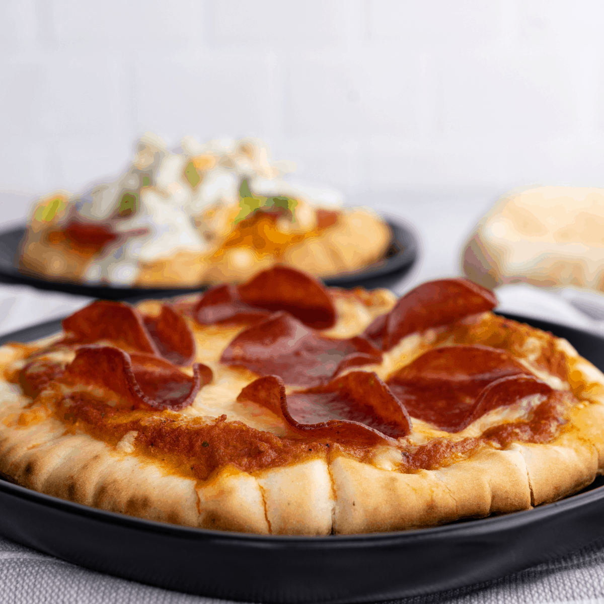 cheese and pepperoni pita pizzas