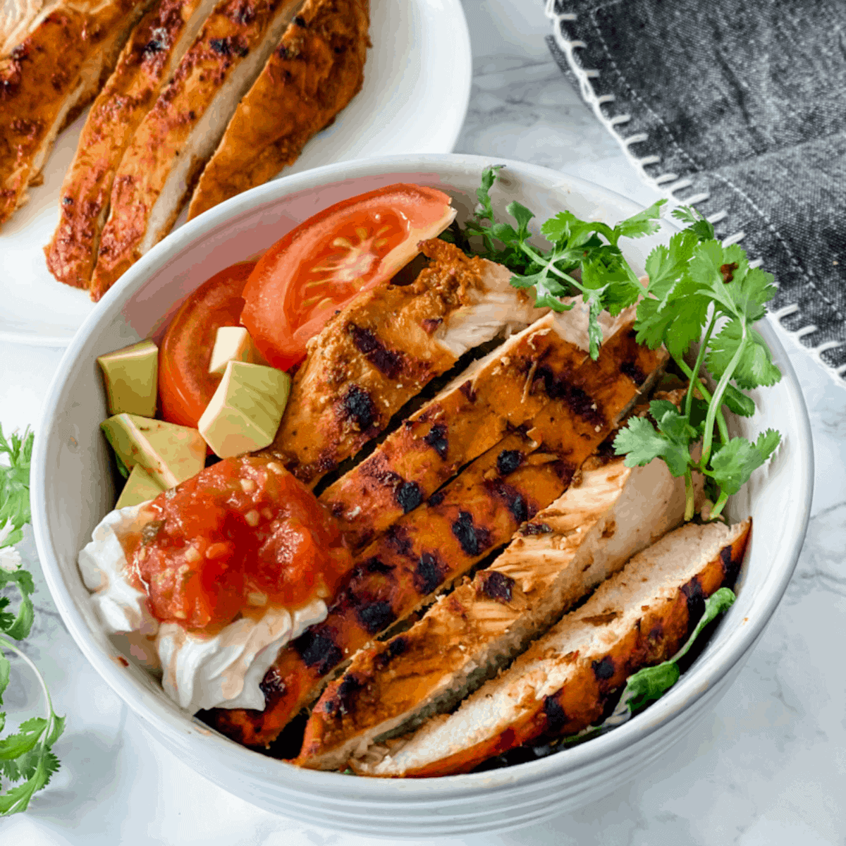 chipotle chicken marinade. grilled chicken on salad.