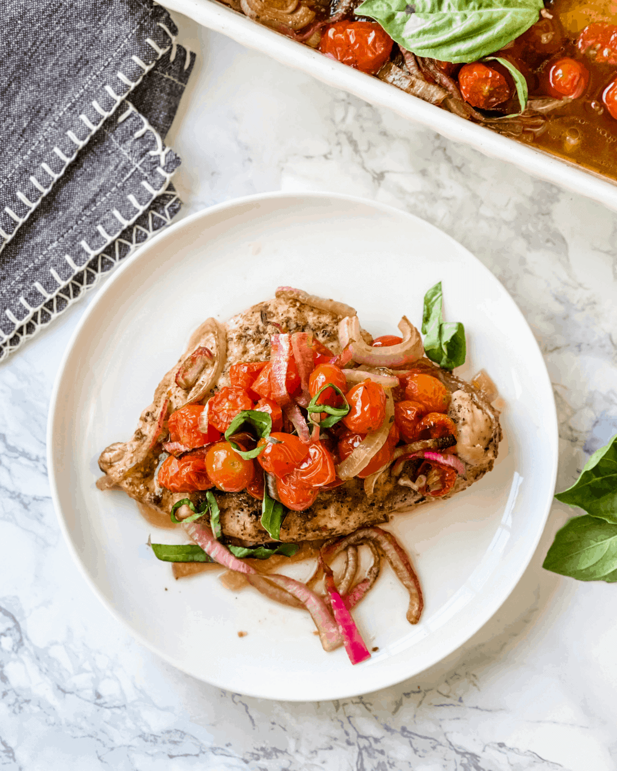 baked bruschetta chicken on a plate