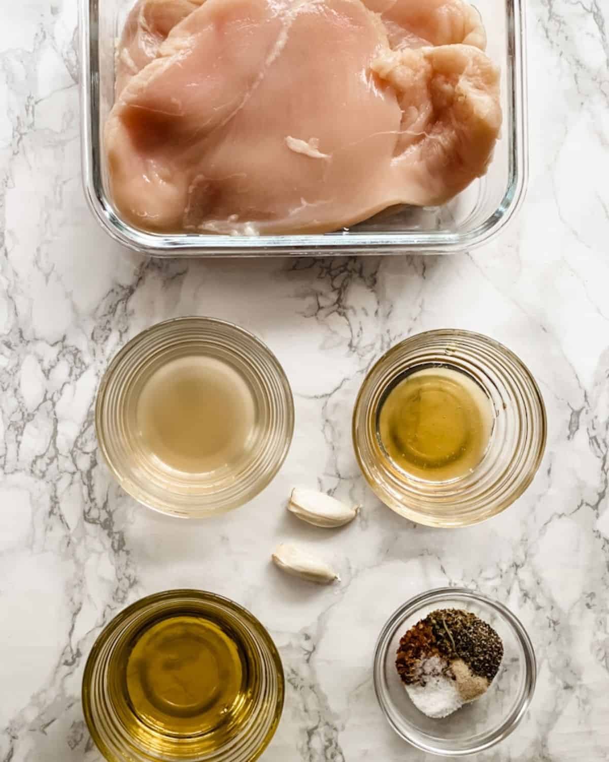 The ingredients to make an italian marinade for grilled chicken