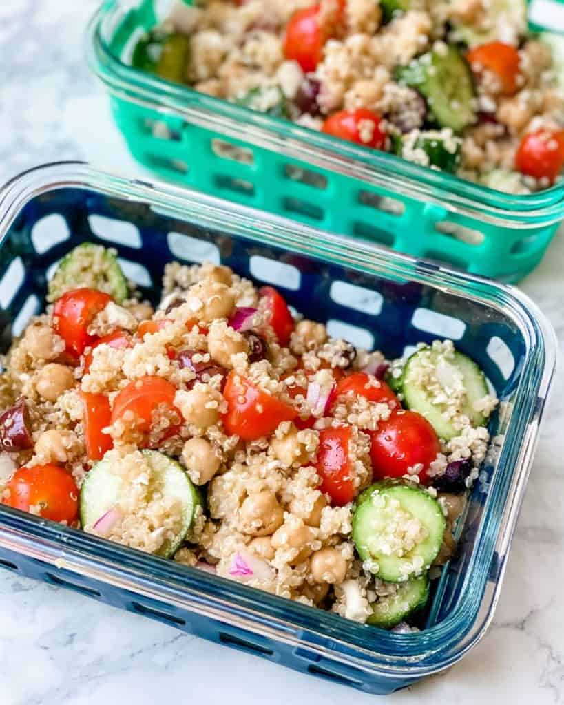 greek quinoa salad in meal prep containers.