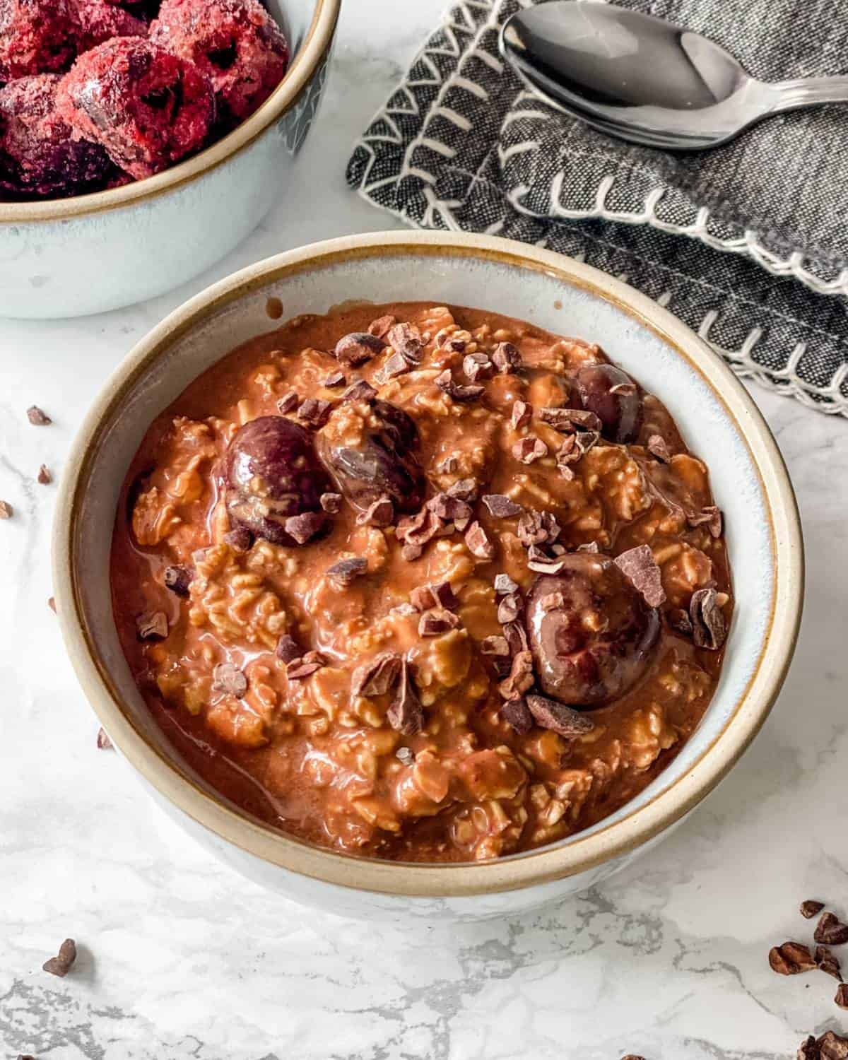 a bowl of Black Forest overnight oats.