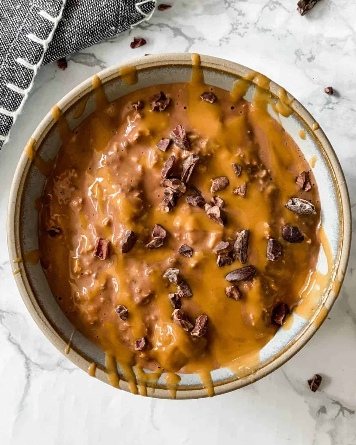 creamy pudding-like overnight oats with chocolate and peanut butter. 