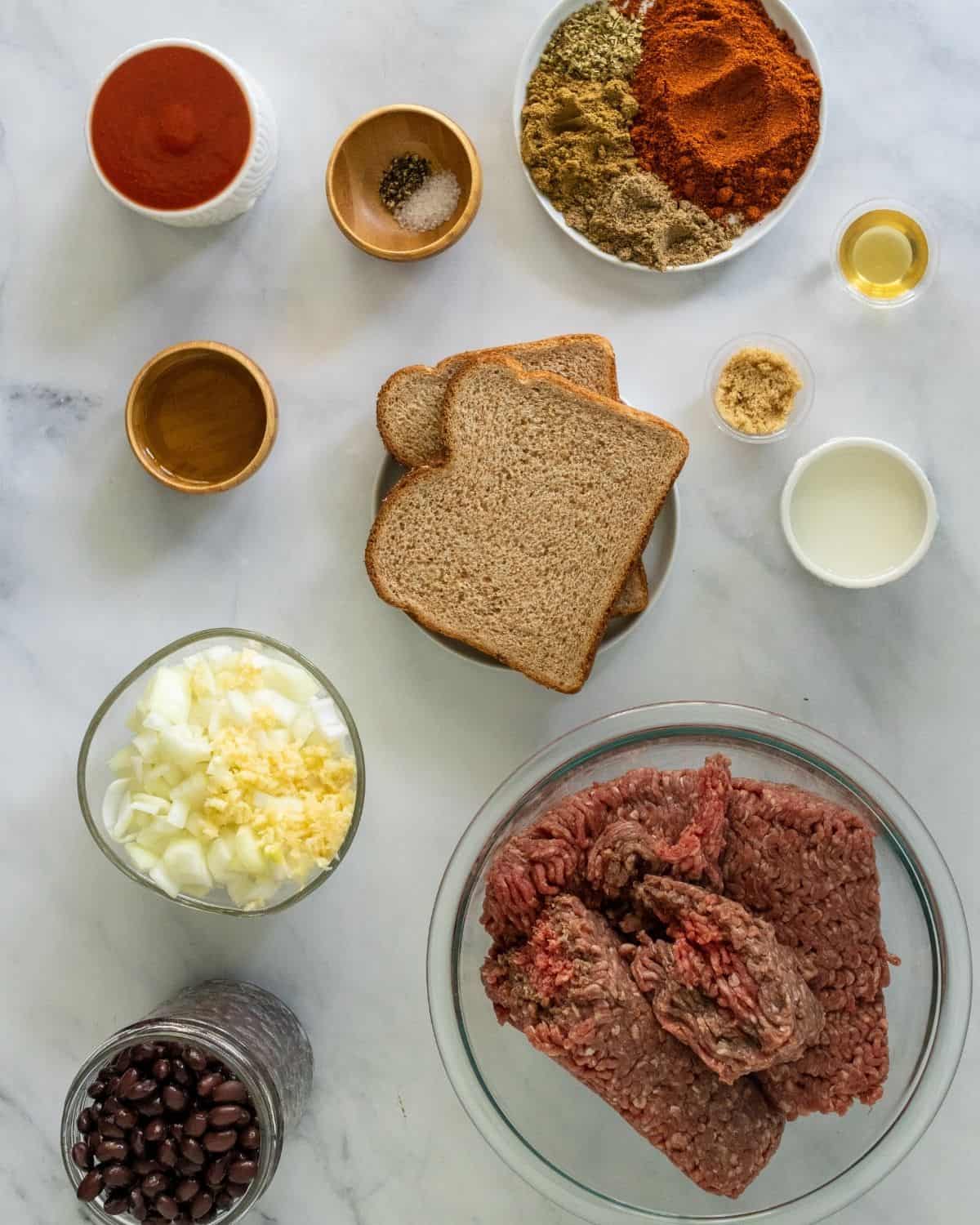 Ingredients to make beef taco meat in the crockpot