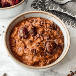 overhead close-up view of black forest overnight oats.