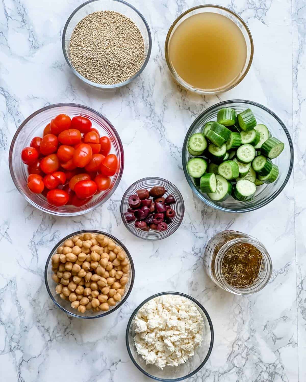 Ingredients to make a Greek Quinoa Salad