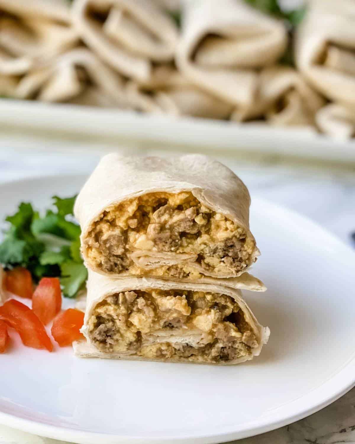 freezer burritos with sausage and cheese on a plate.