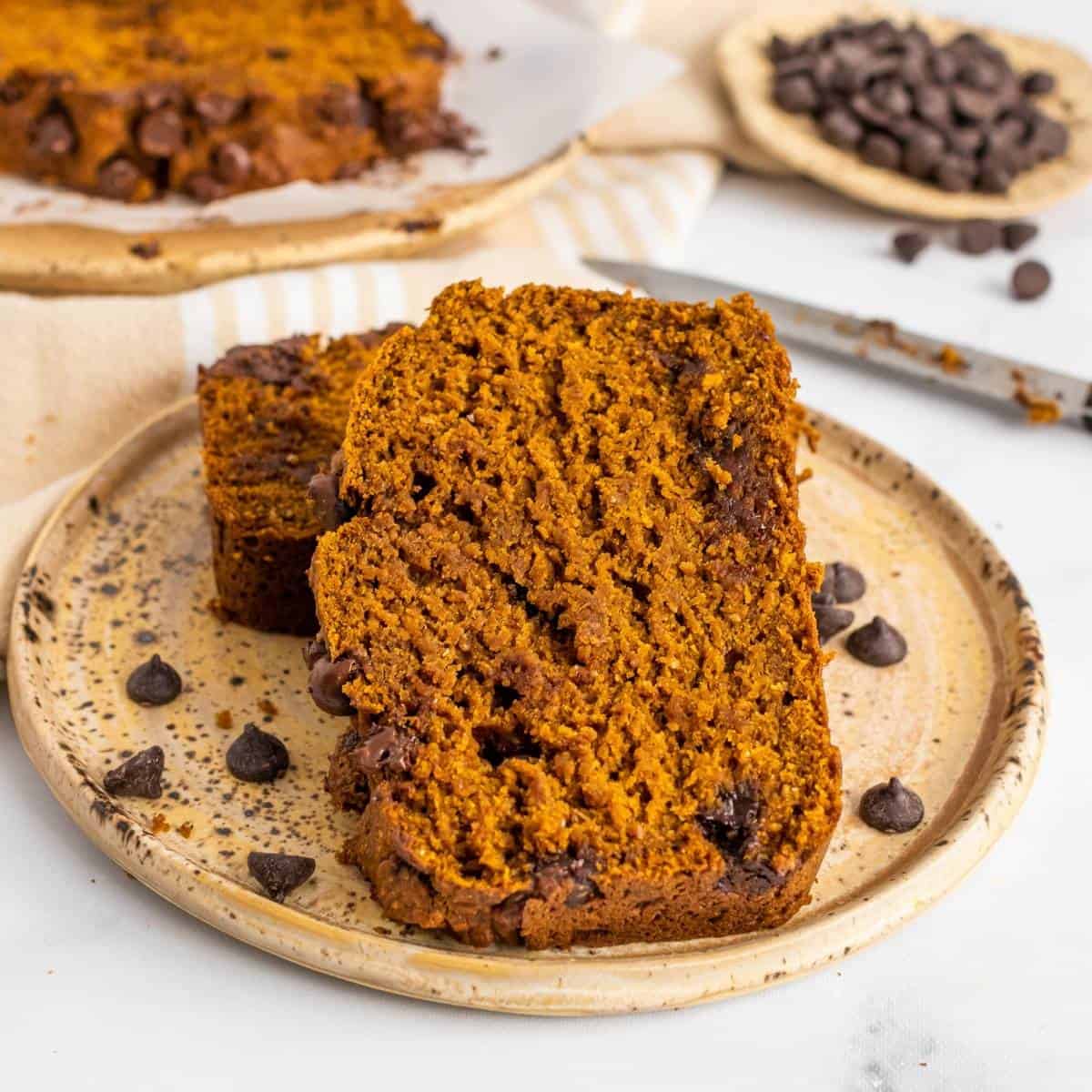 two slices of healthy pumpkin bread with chocolate chips