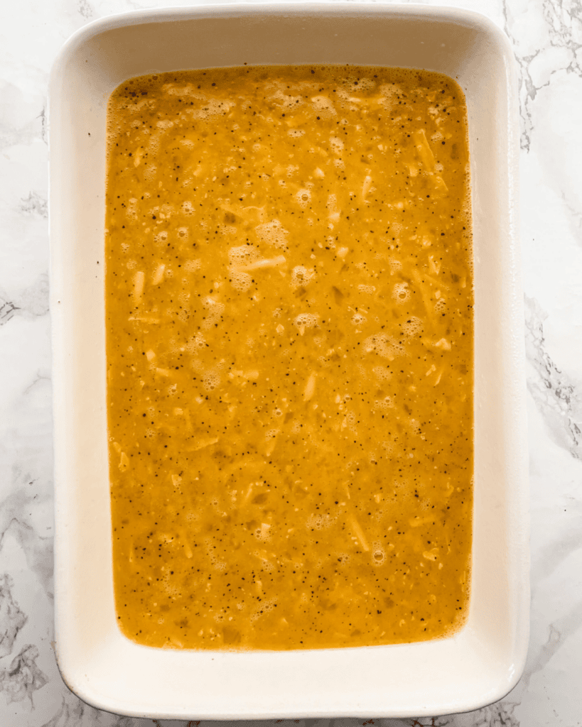 egg mixture and cheese in the casserole dish.