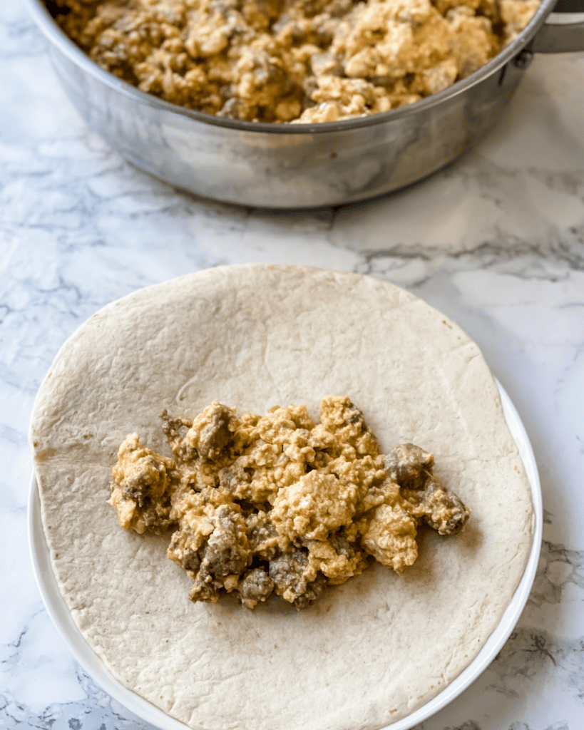 egg mixture in the center of the tortilla
