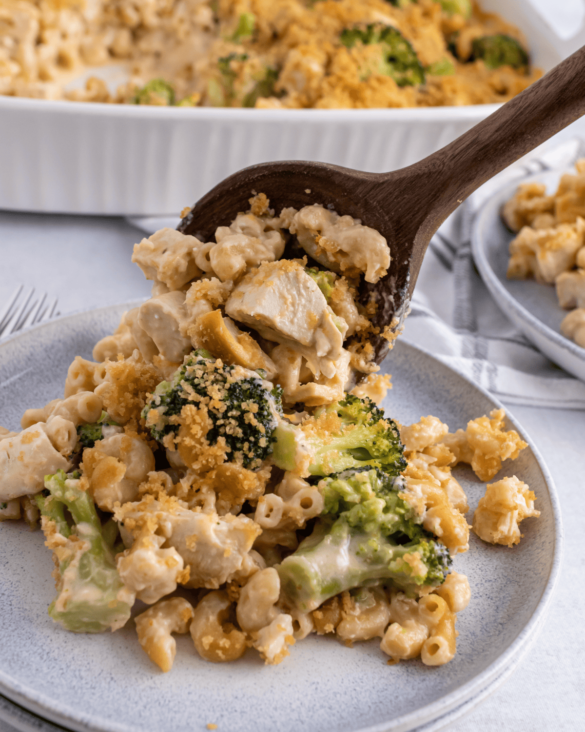 chicken pasta broccoli bake scooped out.