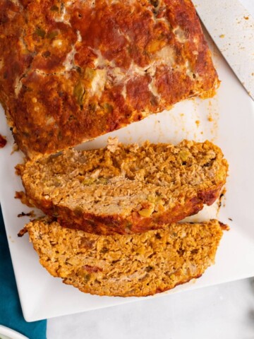 slices of mexican meatloaf on a white platter