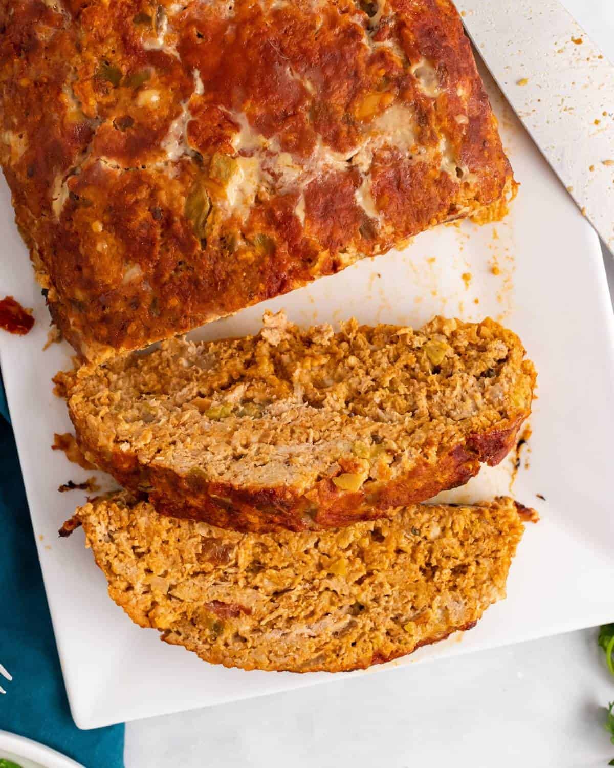 sliced mexican meatloaf on a platter.